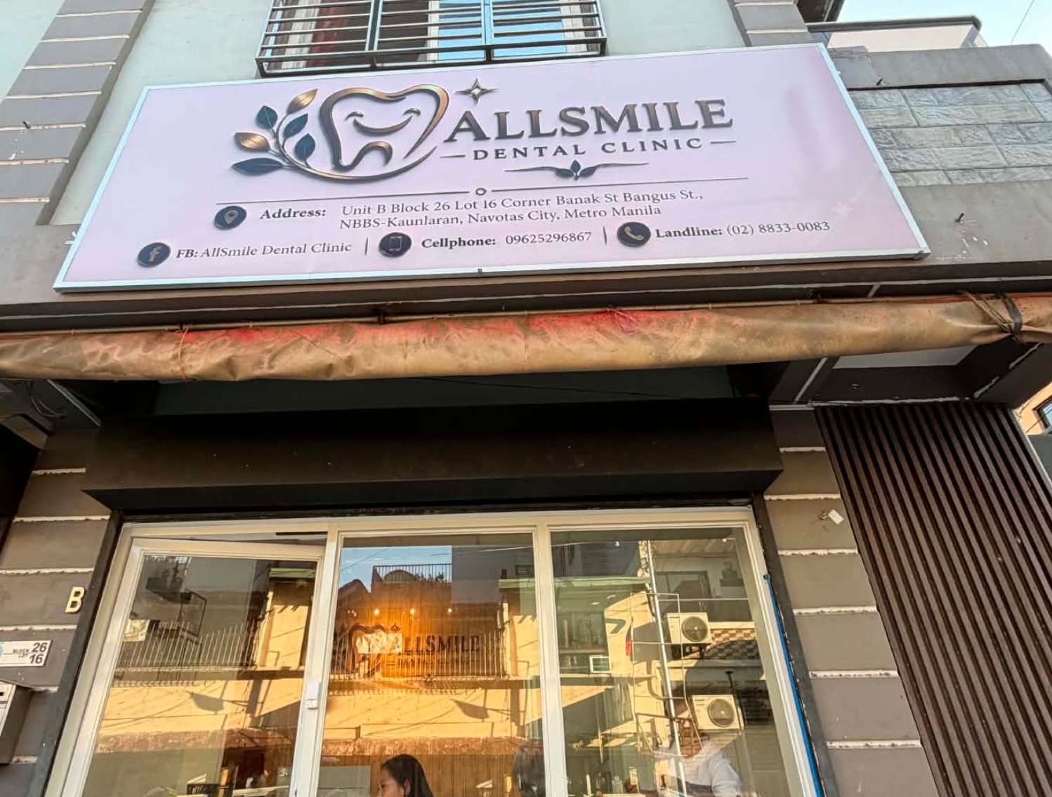AllSmile Dental Clinic storefront signage in Navotas City